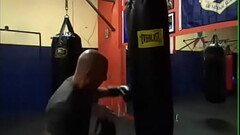 MAXXX LOADZ WORKING OUT ON HEAVY BAG WITH BOXING GLOVES ON STRIKING THE BAG Thumb